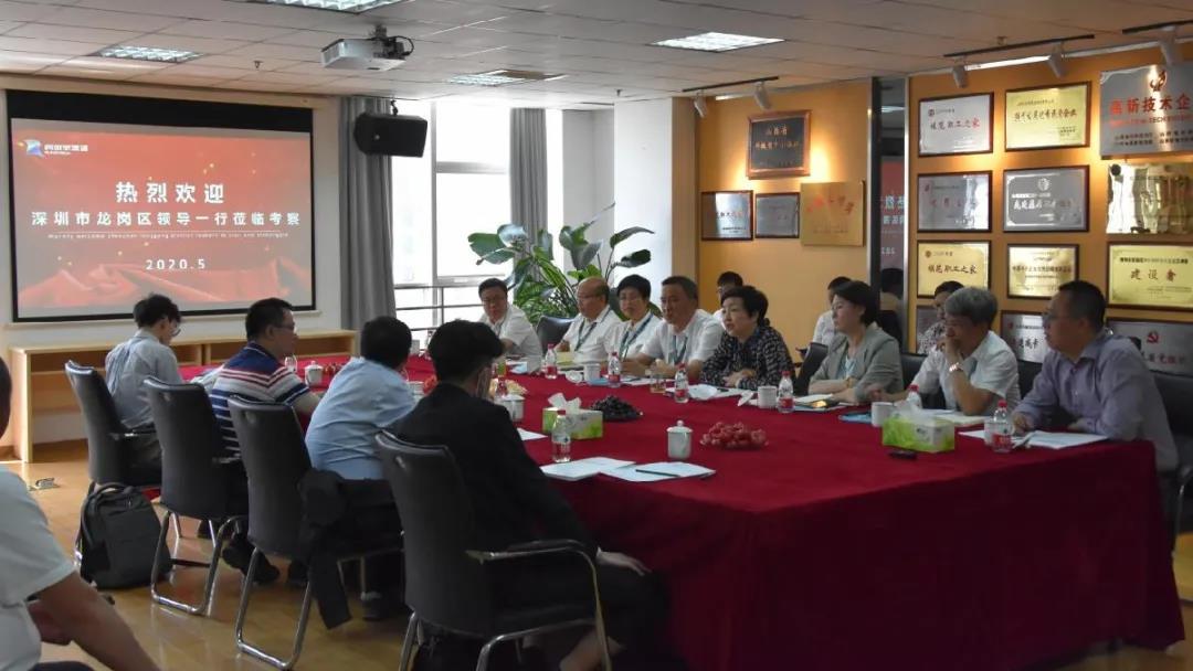 深圳市龙岗区政府领导一行 赴风暴娱乐新能源控股集团调研考察
