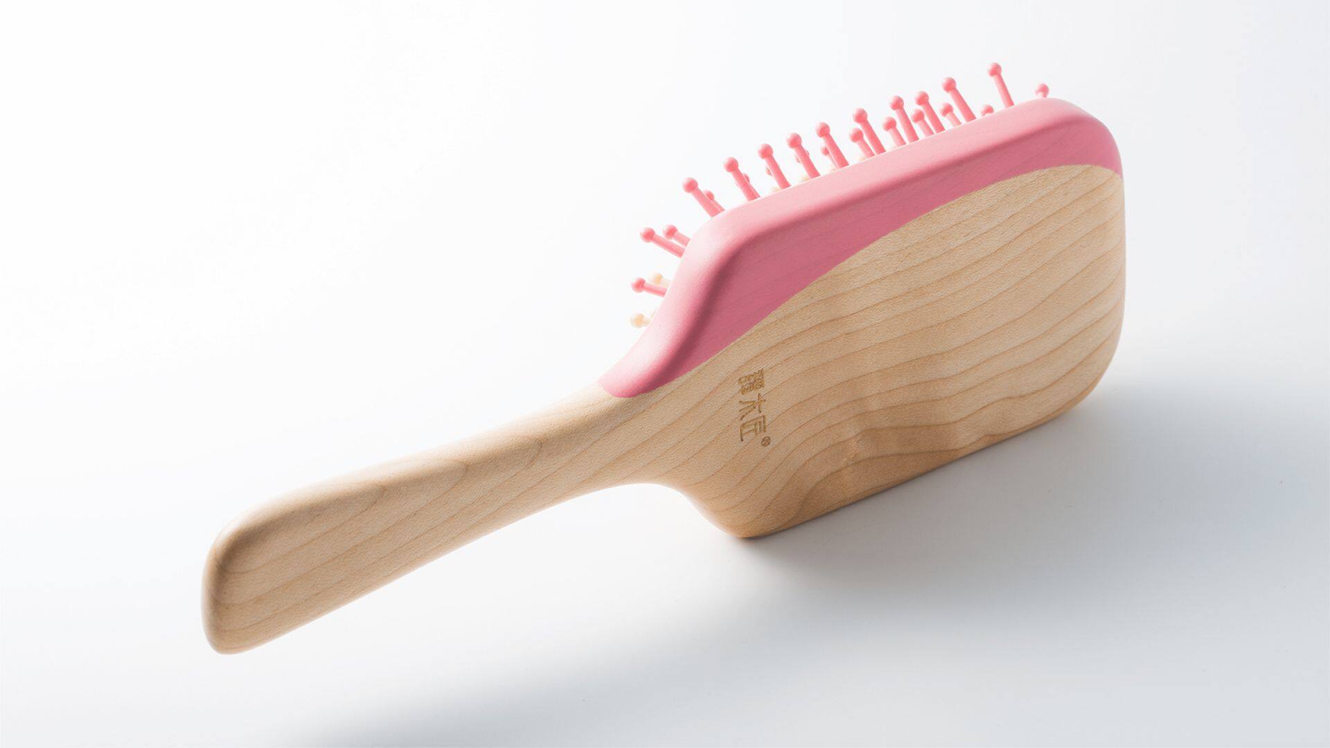谭木匠桃花梳设计-谭木匠桃花梳设计